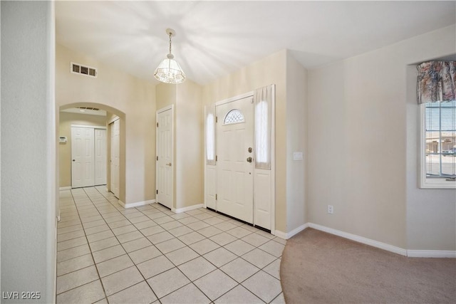 entrance foyer featuring light tile patterned floors