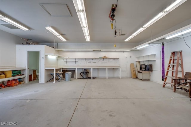 5625 W Agate Ave, Las Vegas, NV 89139 - garage featuring a workshop area