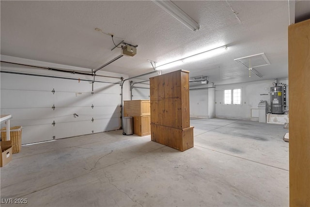 garage with a garage door opener and secured water heater