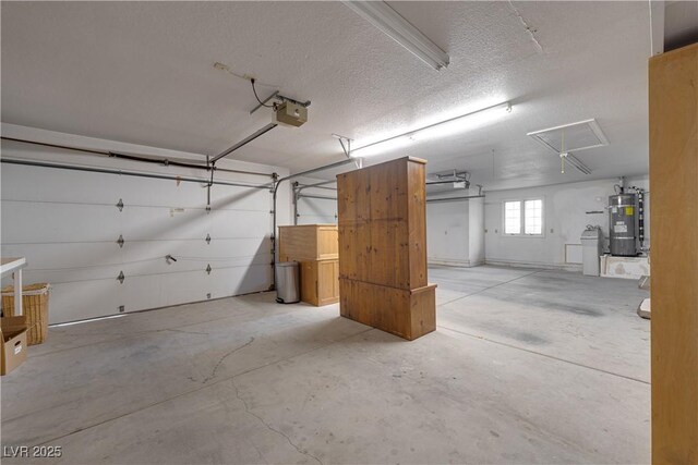 5625 W Agate Ave, Las Vegas, NV 89139 - garage with a garage door opener and secured water heater