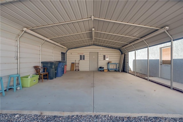 garage featuring a carport