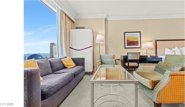 carpeted living room with crown molding