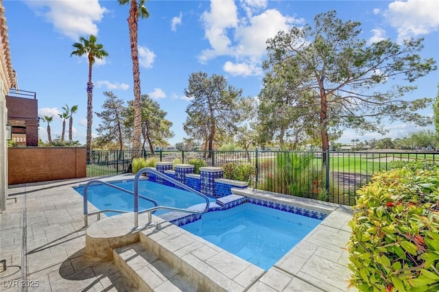 view of pool featuring an in ground hot tub and a patio area