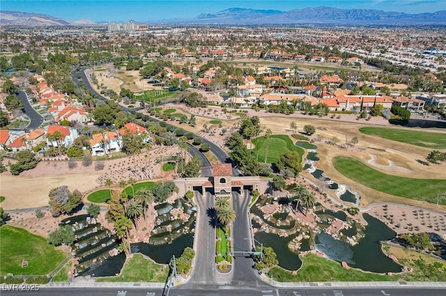 aerial view featuring a water and mountain view