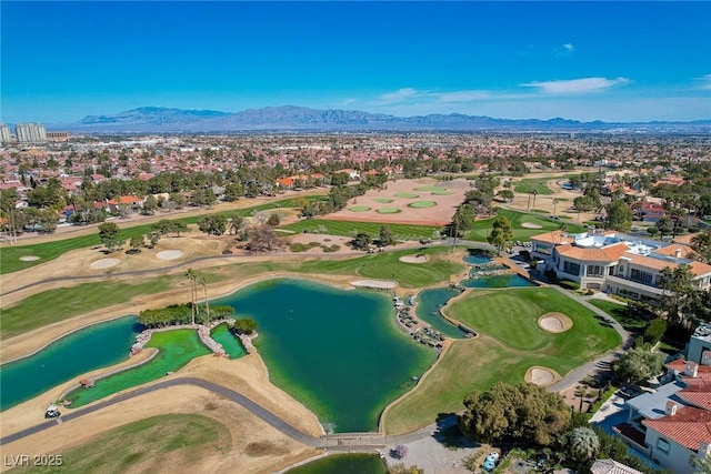 bird's eye view featuring a water and mountain view