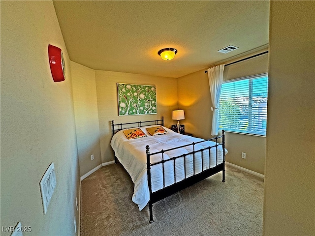 bedroom featuring carpet flooring