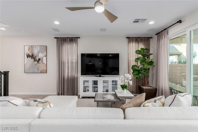 living room with ceiling fan