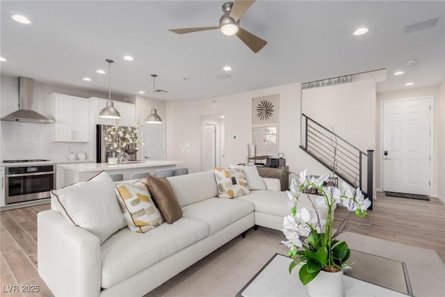 living room with ceiling fan