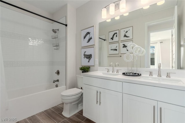 full bathroom featuring vanity, shower / tub combo with curtain, and toilet