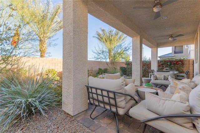 view of patio / terrace featuring an outdoor hangout area and ceiling fan