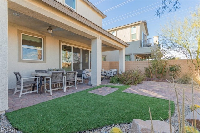 view of yard featuring a patio area and outdoor lounge area