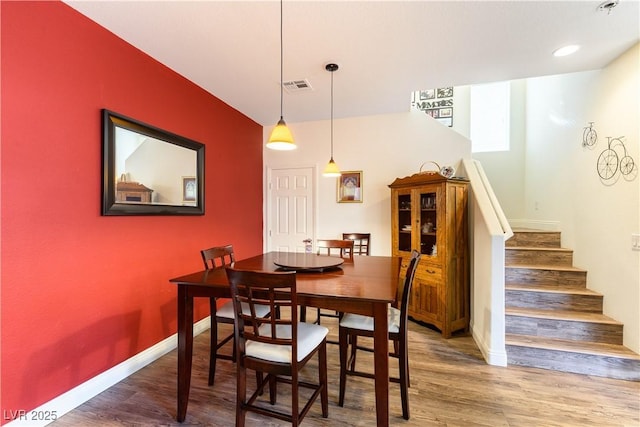 dining room featuring hardwood / wood-style flooring