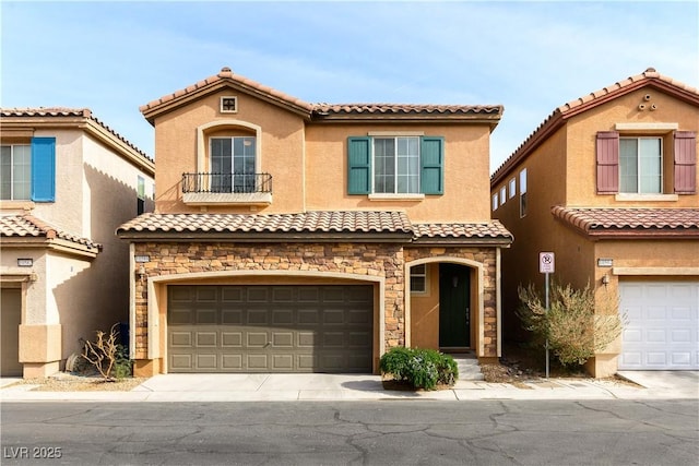 mediterranean / spanish-style home with a garage