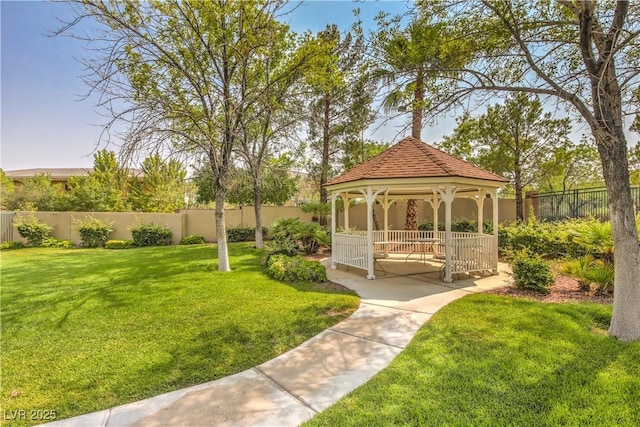 view of community featuring a gazebo and a yard