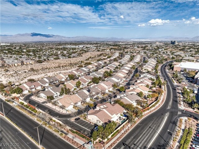 drone / aerial view featuring a mountain view