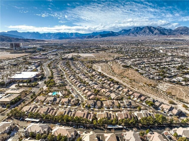 drone / aerial view featuring a mountain view