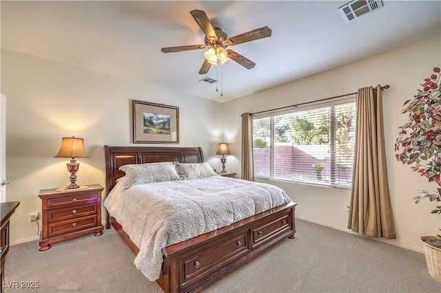 bedroom with light carpet and ceiling fan