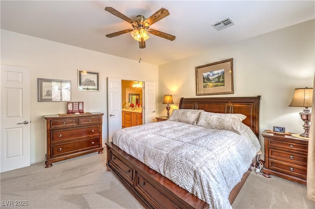 bedroom with light carpet and ceiling fan