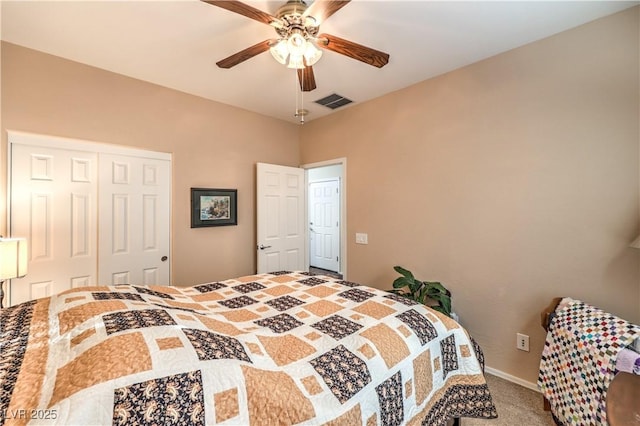 bedroom featuring a closet, ceiling fan, and carpet