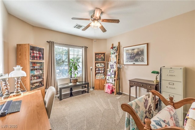 office area featuring ceiling fan and carpet