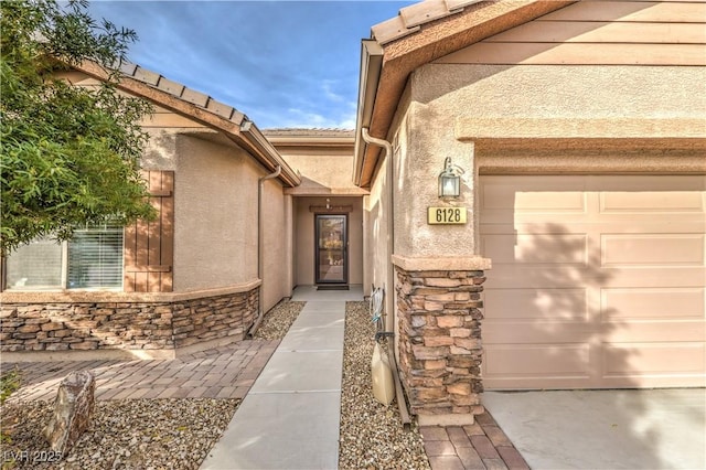 entrance to property with a garage