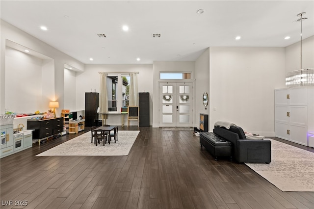 living room featuring dark wood-type flooring