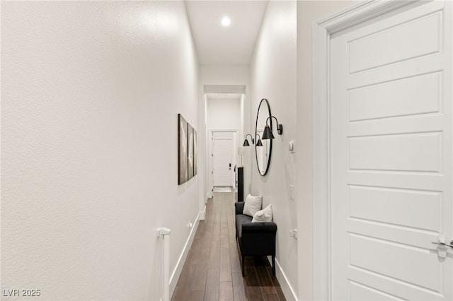 hallway featuring dark hardwood / wood-style floors