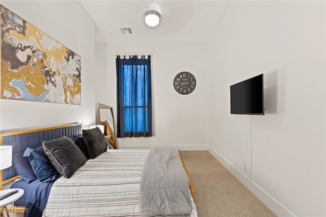 bedroom featuring carpet