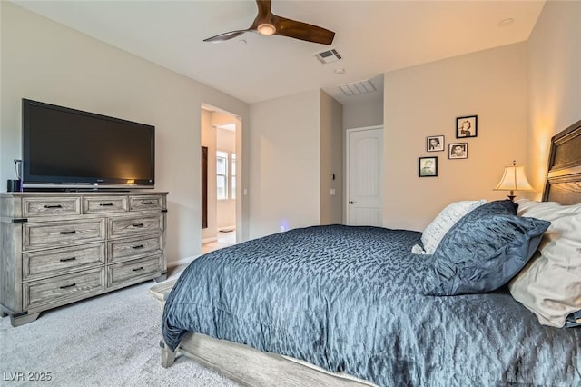 bedroom with light carpet and ceiling fan