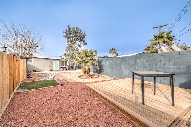 view of yard featuring a deck