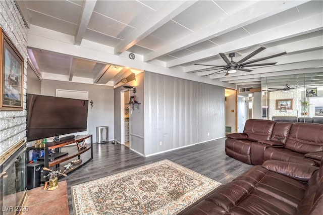 living room with beamed ceiling, ceiling fan, and hardwood / wood-style floors