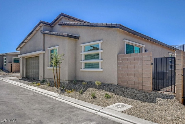 view of home's exterior with a garage