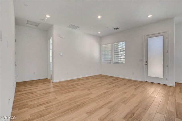 empty room featuring light wood-type flooring