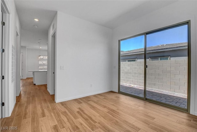 empty room featuring light hardwood / wood-style floors