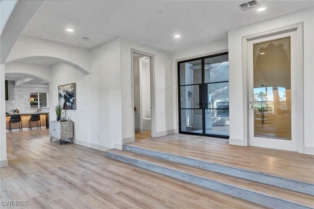 interior space with light hardwood / wood-style flooring