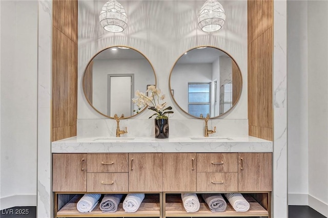 bathroom featuring double vanity and a sink