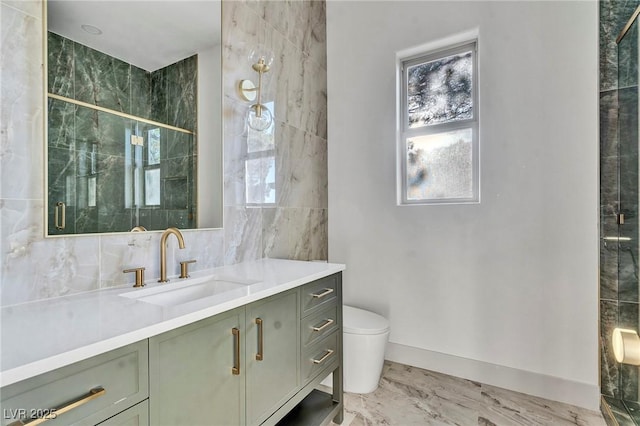 bathroom featuring toilet, vanity, tile walls, a shower stall, and decorative backsplash