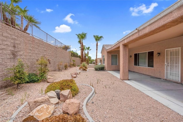 view of yard with a patio area