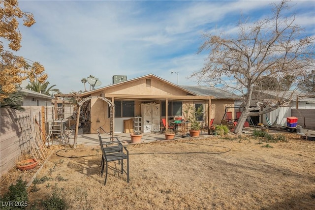 back of house featuring a patio