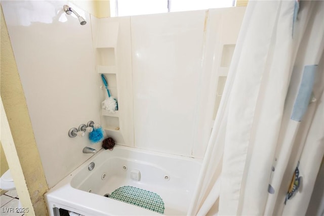 bathroom featuring shower / bath combo