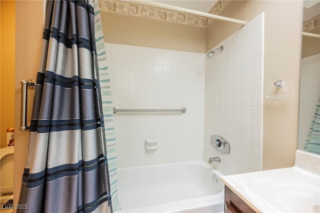 bathroom featuring vanity and shower / tub combo