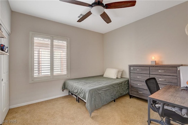 bedroom featuring visible vents, ceiling fan, light carpet, and baseboards