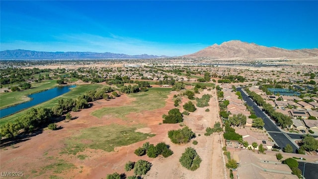 bird's eye view featuring a residential view and a water and mountain view