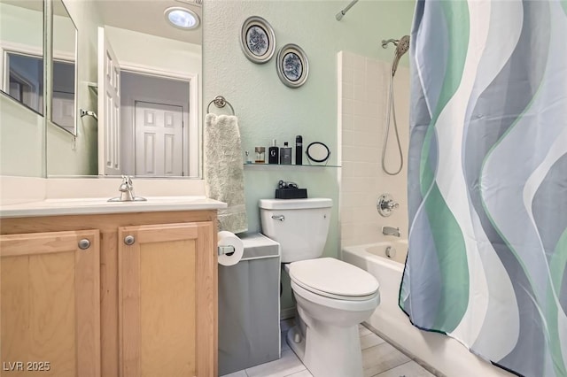 full bathroom featuring shower / tub combo with curtain, vanity, toilet, and tile patterned floors