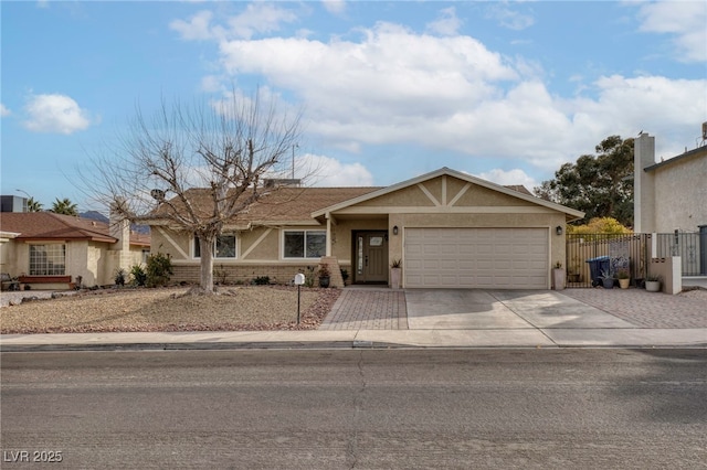 single story home featuring a garage