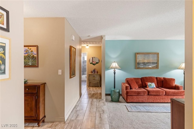 living room with a textured ceiling