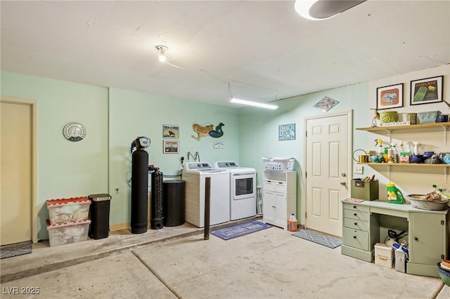 laundry area with washing machine and clothes dryer