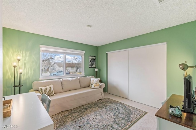 living room featuring a textured ceiling