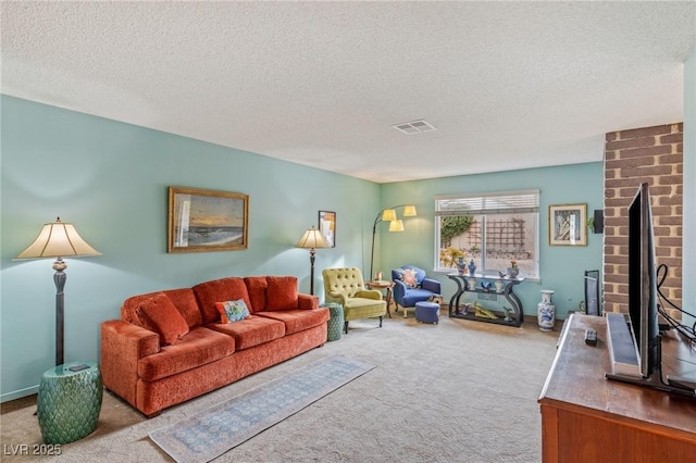 living room with light carpet, a textured ceiling, and a fireplace