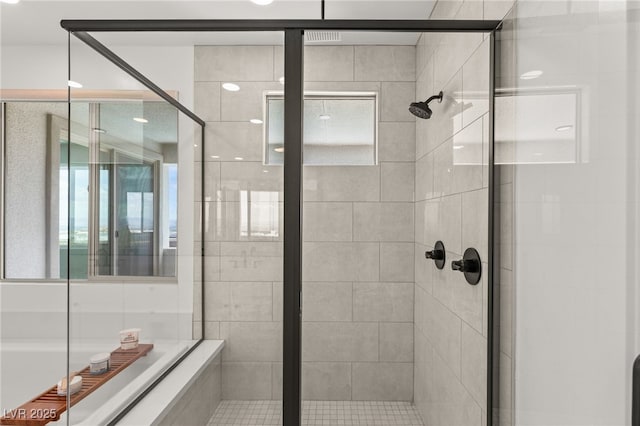 bathroom with a shower stall